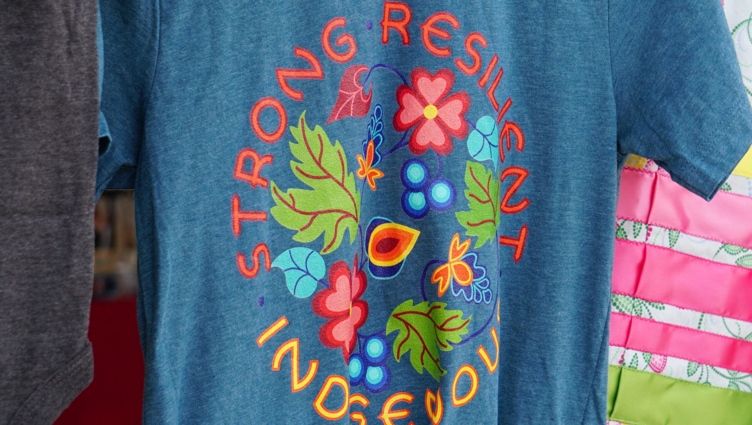 strong resilient indigenous shirt design, adult teal